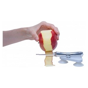 Suction cup mounted fruit and vegetable peeler